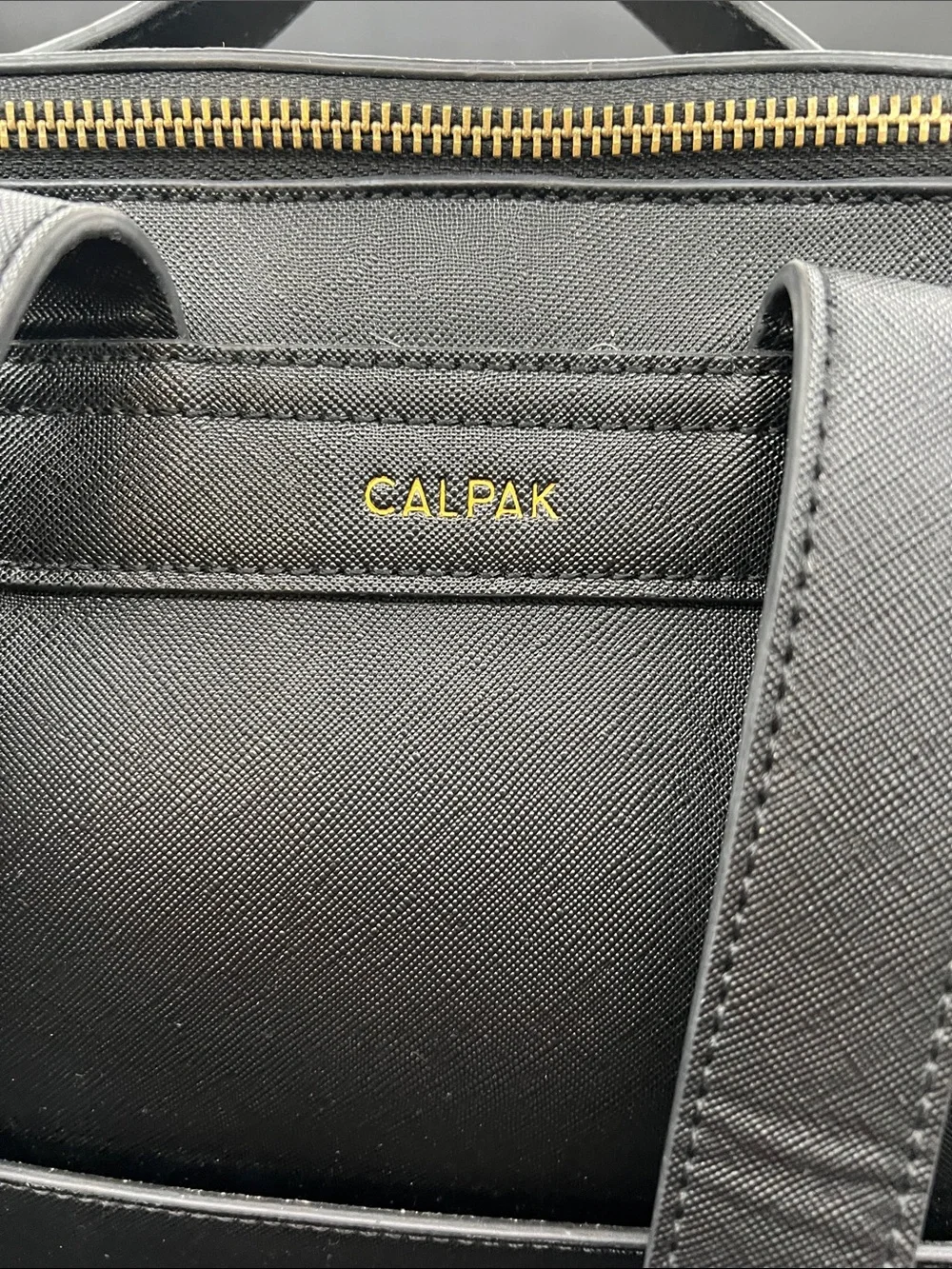 Calpak Black Faux Leather Backpack with Gold Hardware